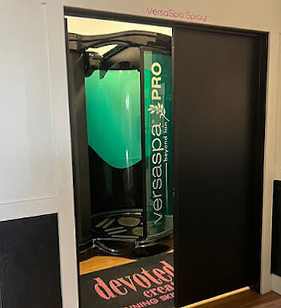 Spray tanning booth in Club Sun Kalispell
